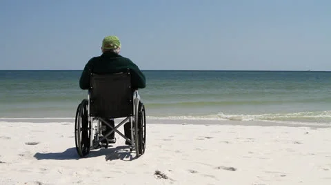 Man Wheelchair Beach Video stock 24741761