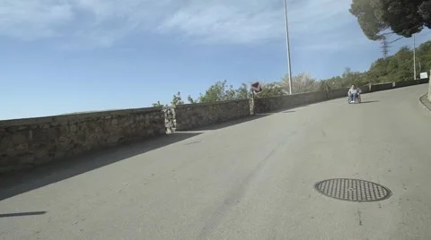 Man In Wheelchair Down The Road Stock Footage 64545709
