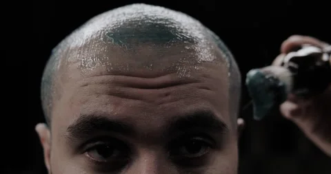 A man while barber applying shaving cream on his head using shaving brush. Stock Footage 150273512