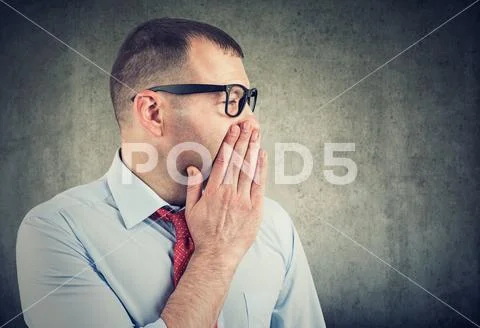 Man whispering private information a secret Stock Photos