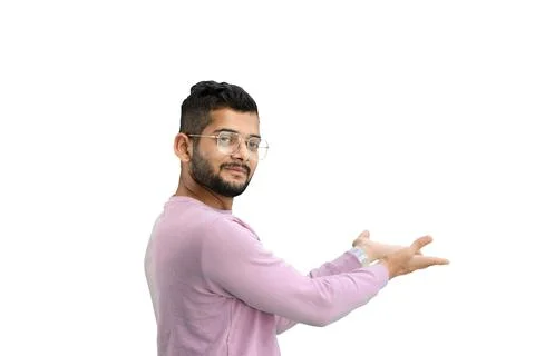 A man, on a white background, in close-up, points to the side Foto stock
