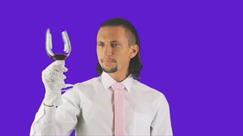 A man in white gloves drinks the wine Stock-Footage 41415157