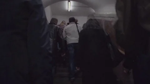 A man in a white jacket among the crowd Stock Footage 69222558