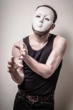 Man with white mask Stock Photos