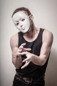 Man with white mask Stock Photos