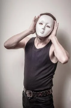 Man with white mask Stock Photos