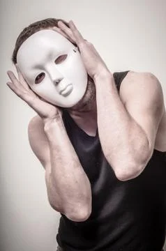 Man with white mask Stock Photos