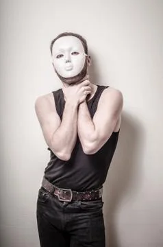 Man with white mask Stock Photos