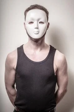 Man with white mask Stock Photos