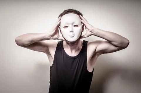 Man with white mask Stock Photos