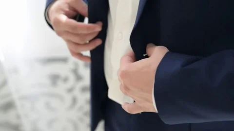 Man in white shirt buttons jacket Video stock 70911880