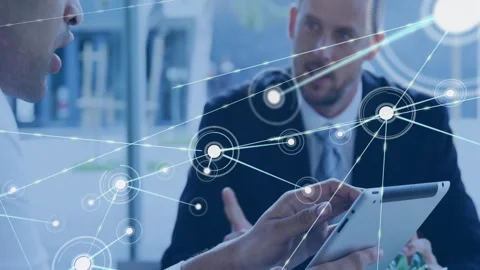 Man in white shirt tapping tablet initiating network data visualization while Stock Footage 309688041