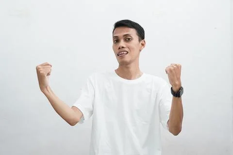 A man in a white shirt on a white background Stock Photos