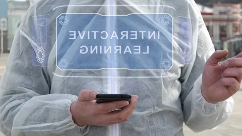 Man in white with text Interactive Learning Stock Footage 145584447