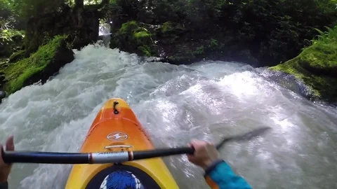 Man whitewater kayaking through river Stock-Footage 72501770