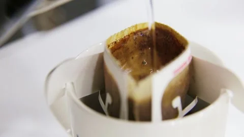 The man who is making drip bag coffee Stock Footage 286713070