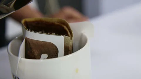 The man who is making drip bag coffee Stock Footage 286713085