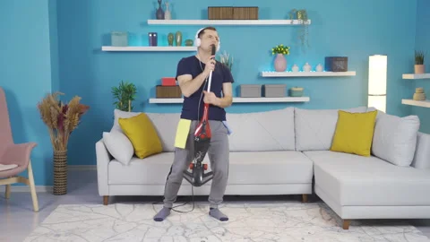 The man who started singing by imagining the broom in his hand  Stock Footage 232296350