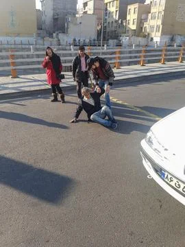 A man who threw himself down in the middle of the street Stock Photos