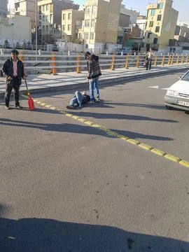 A man who threw himself down in the middle of the street Stock Photos