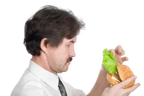 Man will get from hamburger sheet salad Stock Photos
