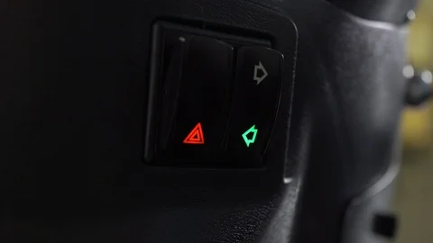The man will turn on and off the button of the head and the red triangle Stock Footage 128679806