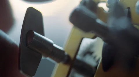 Man winding clockwork mechanism Stock Footage 35005135