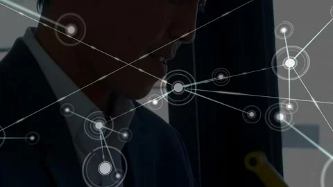 Man by window, HUD appearing over temple initiating node network, tapping yellow Stock Footage 332523227