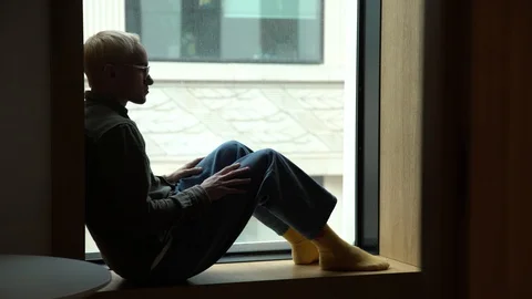 A man at the window in the office Stock Footage 129218590