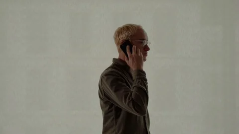 A man at the window in the office Stock Footage 129218649