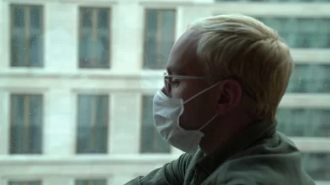 A man at the window in the office Stock Footage 130500027