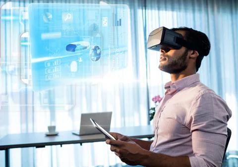 Man by window wearing VR Virtual Reality Headset with Interface 스톡 사진