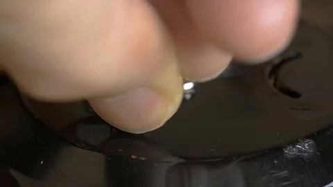 A man winds an old watch Stock Footage 129238080