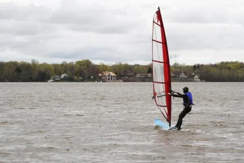 Man windsurfing on a board Foto stock