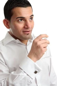 Man with wine looking sideways Stock Photos