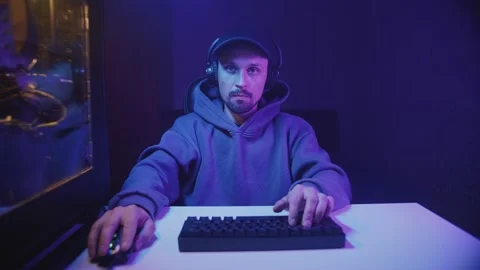 A man wins in computer games Stock Footage 215957558