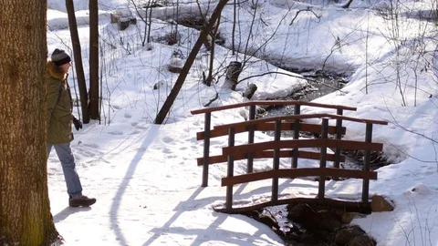 Man in winter forest Stock-Footage 76999823