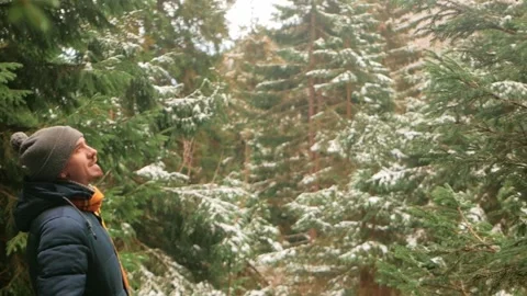 Man in winter forest, in mountains, unity with nature, loneliness, self Stock-Footage 229643085