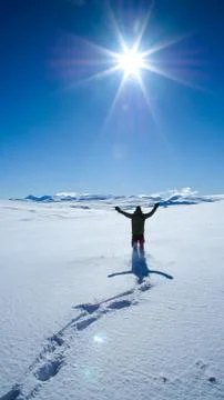 Man in winter mountain landscape Stock Photos
