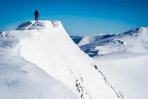 Man in winter mountain Stock Photos