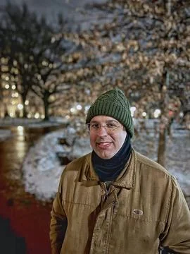 Man in Winter Park at night Stock Photos