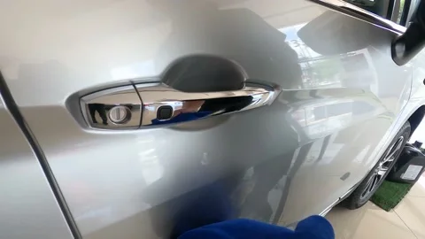 A man wiped the outside of the car Stock Footage 135362090