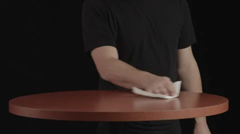 Man wipes table clean 库存影片 32263255