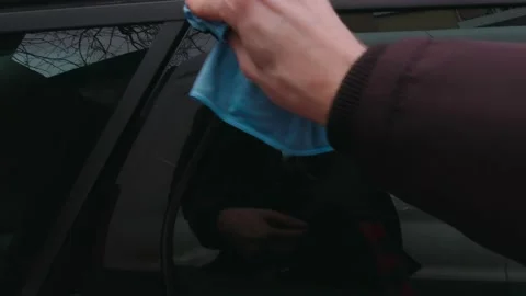 Man Wiping The Car With A Rag Stock Footage 169043953