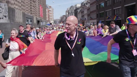 Man Wissle Rainbow flag Protest Walk Rainbow Lhbti+ Gay Pride Netherlands Stock Footage 234409413