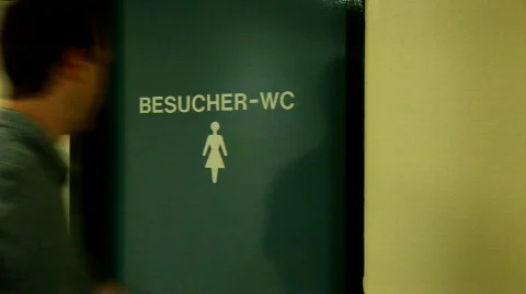 Man at womentoilet Stock Footage 471291