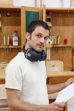 A man in a wood workshop Stock Photos