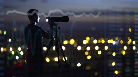 The man work with a camera on the night city light holographic background Video stock 133720724