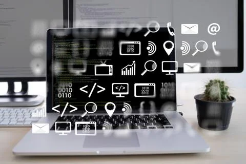 Man work Coding software developer programmer is coding on a desktop computer 库存照片