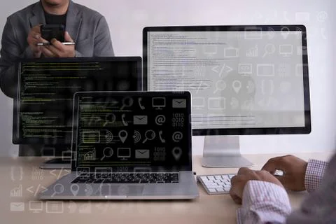 Man work Coding software developer programmer is coding on a desktop computer Foto stock